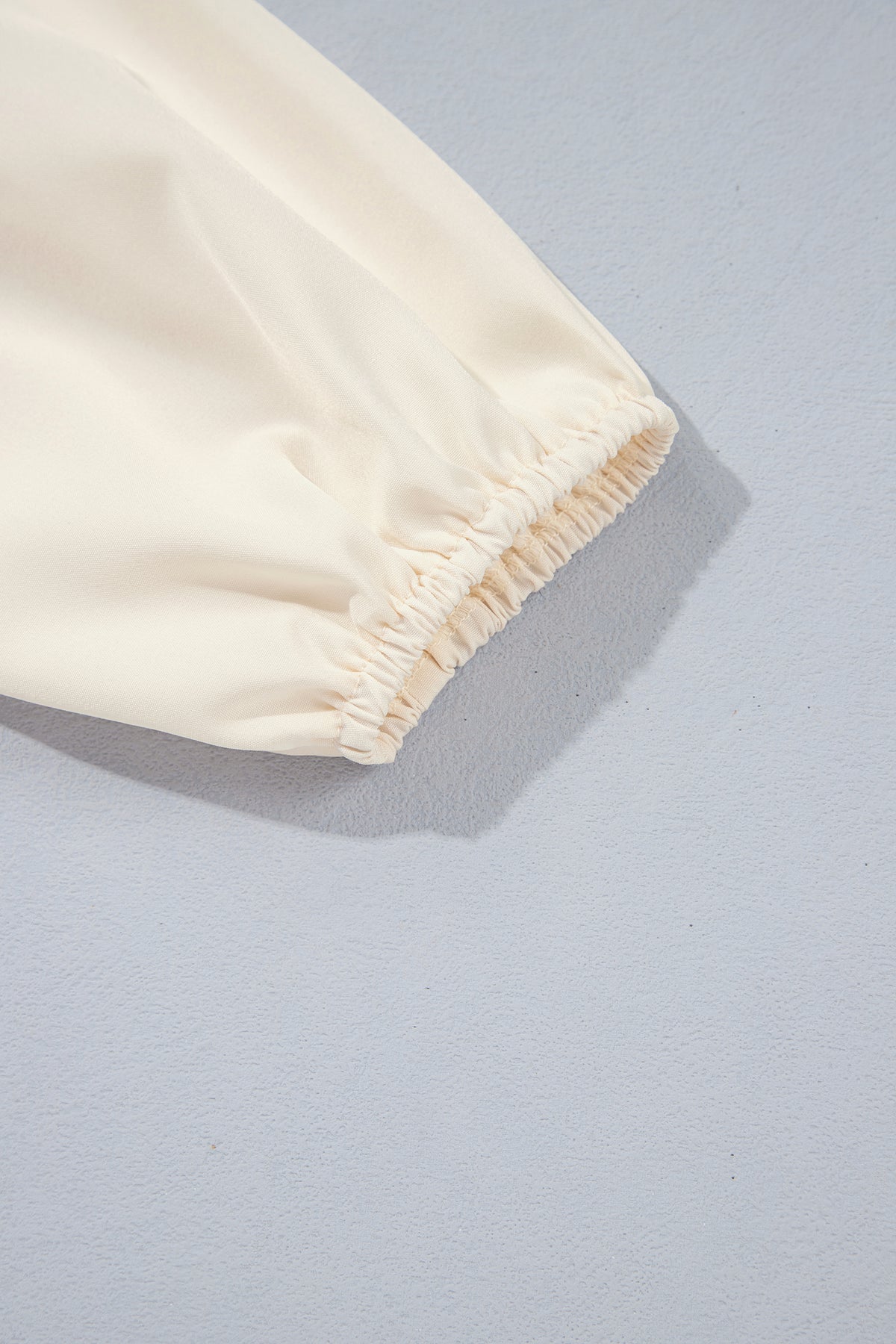 Smocked Ruffle Hem Long Sleeve Blouse