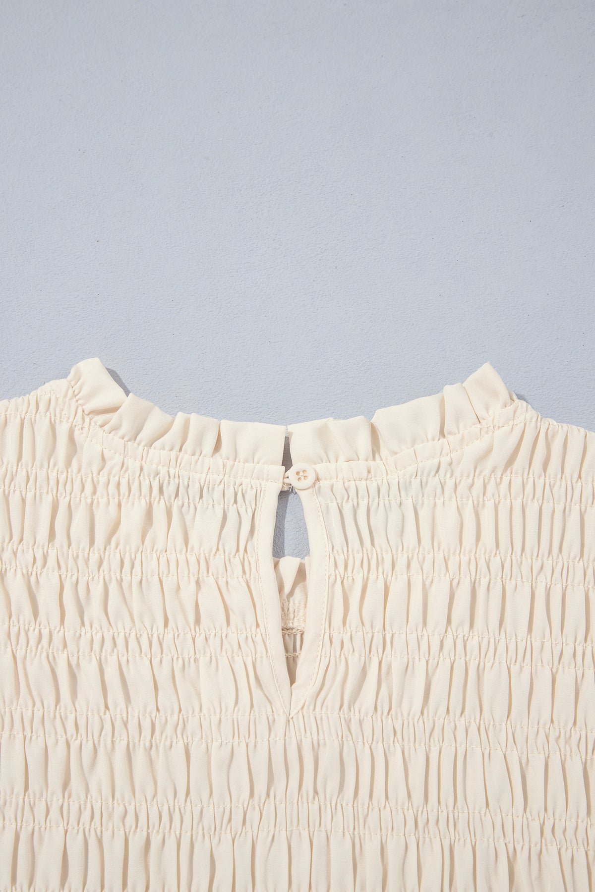Smocked Ruffle Hem Long Sleeve Blouse