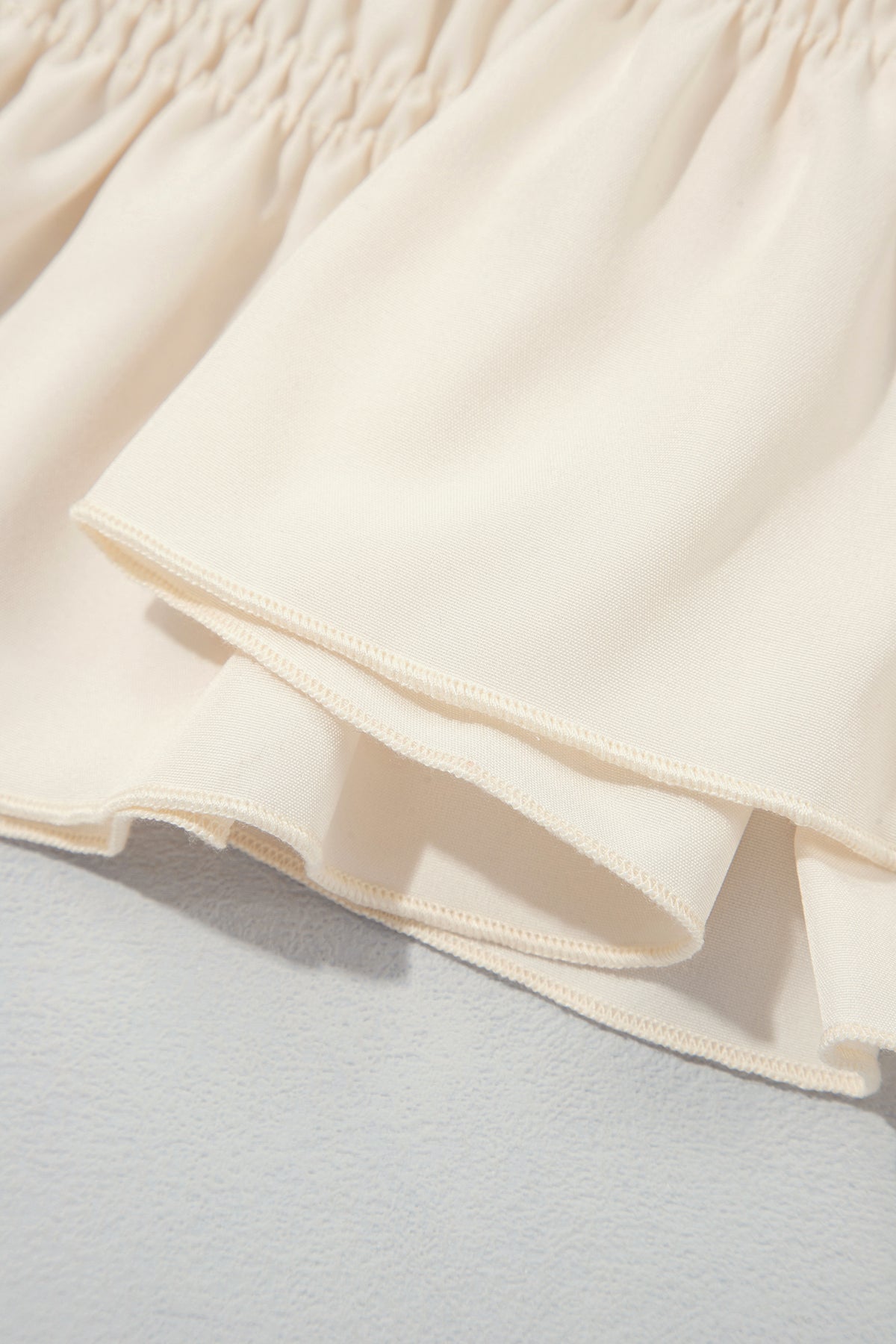 Smocked Ruffle Hem Long Sleeve Blouse